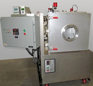 High Vacuum Thermal Shock Chamber System with a Custom Cascade Liquid Chiller System circulating thermal transfer fluid to a chamber internal Thermal Platen.